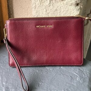 MICHAEL KORS Wine Red Pebbled Leather Wristlet Clutch with Gold Hardware